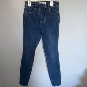 Garage High Rise Lace Up Jeans